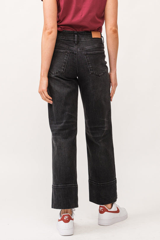 image of a female model wearing a HOLLY HIGH RISE CUFFED HEM STRAIGHT JEANS BLACK DEAR JOHN DENIM 