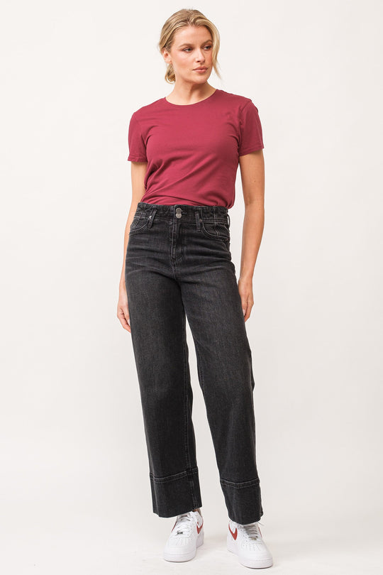 image of a female model wearing a HOLLY HIGH RISE CUFFED HEM STRAIGHT JEANS BLACK DEAR JOHN DENIM 