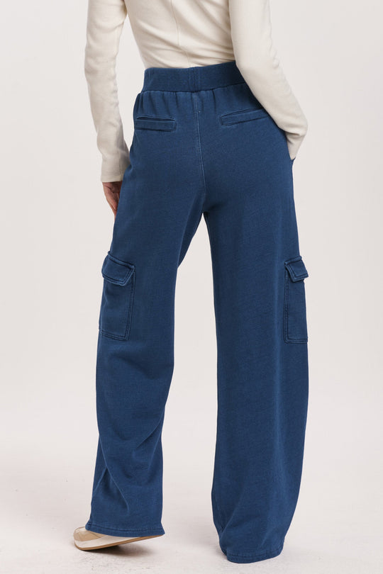 image of a female model wearing a BECCA HIGH RISE CARGO PANTS DARK INDIGO DEAR JOHN DENIM 