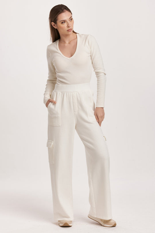 image of a female model wearing a BECCA HIGH RISE CARGO PANTS OFF WHITE DEAR JOHN DENIM 