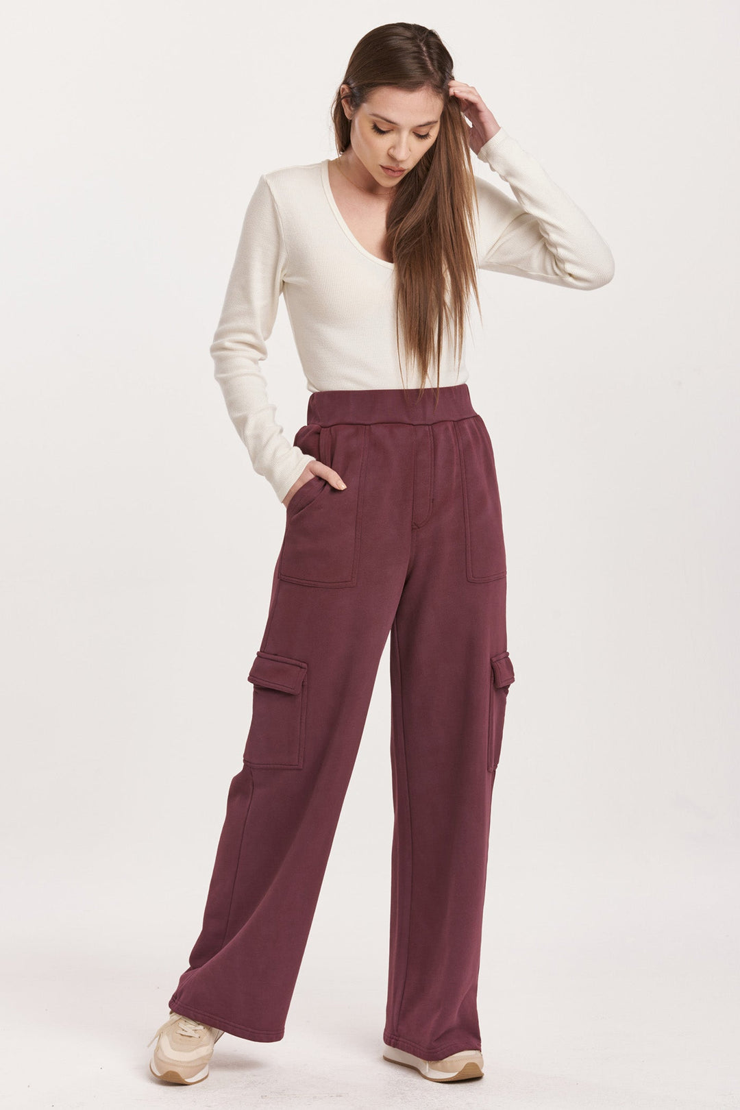 image of a female model wearing a BECCA HIGH RISE CARGO PANTS PLUM BERRY DEAR JOHN DENIM 