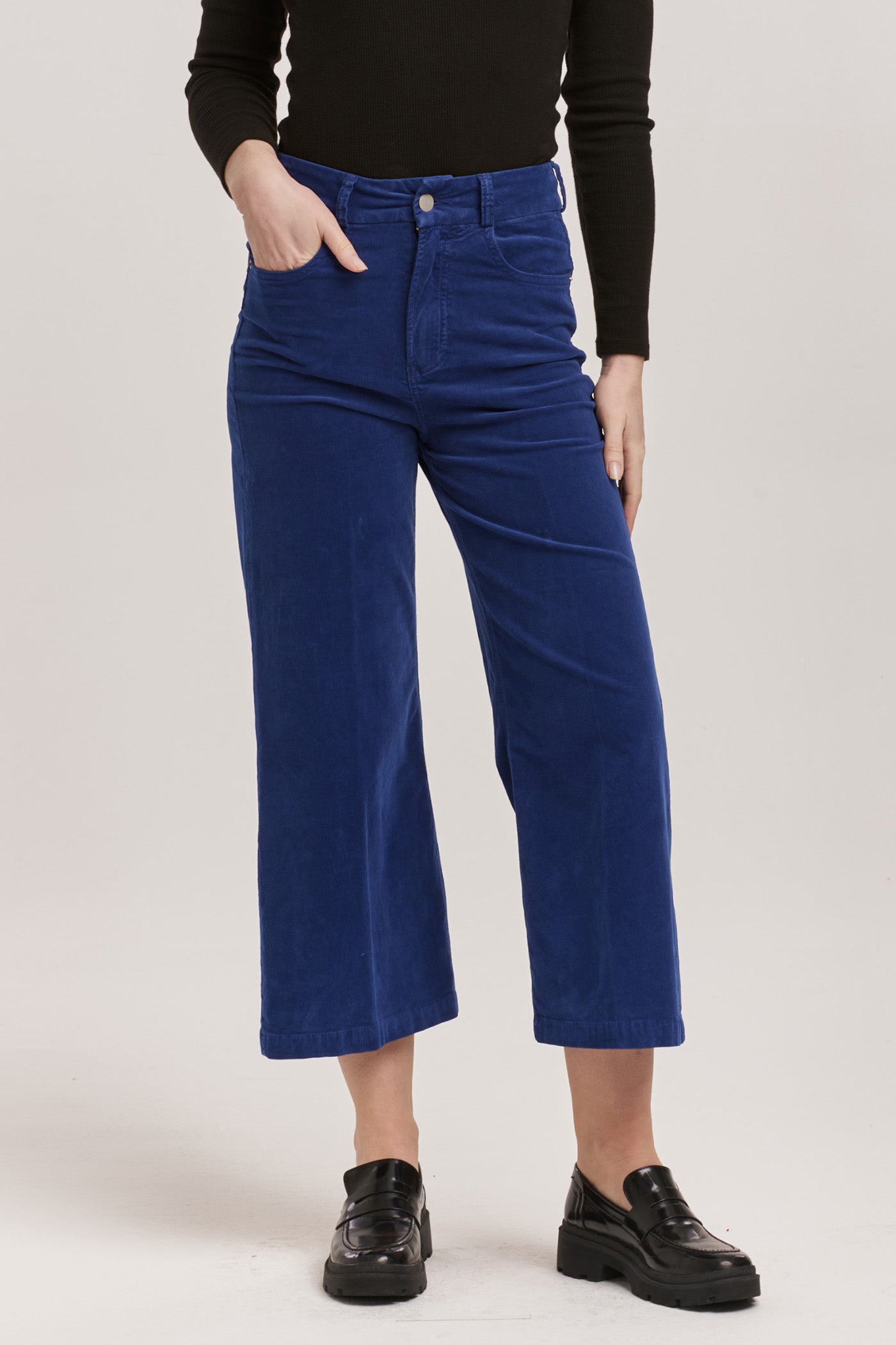 image of a female model wearing a AUDREY HIGH RISE CROPPED WIDE LEG PANTS ROYAL BLUE CORDUROY DEAR JOHN DENIM 