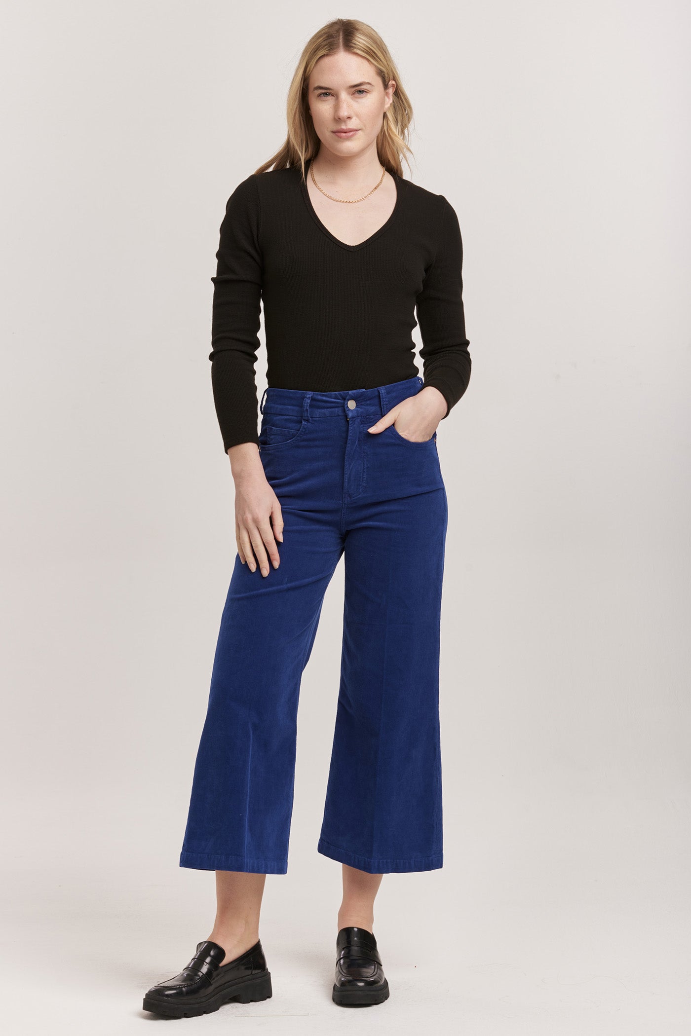 image of a female model wearing a AUDREY HIGH RISE CROPPED WIDE LEG PANTS ROYAL BLUE CORDUROY DEAR JOHN DENIM 