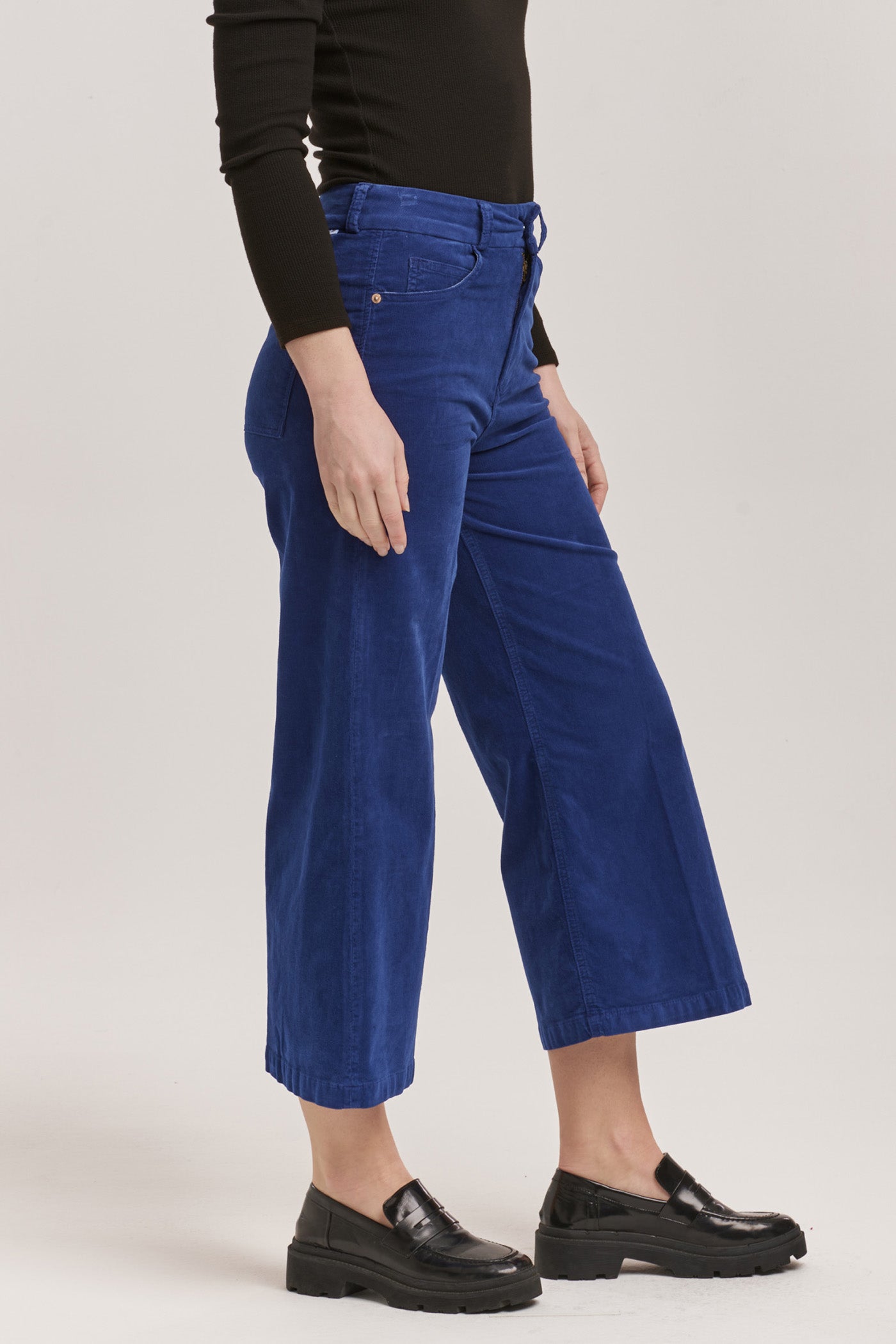 image of a female model wearing a AUDREY HIGH RISE CROPPED WIDE LEG PANTS ROYAL BLUE CORDUROY DEAR JOHN DENIM 