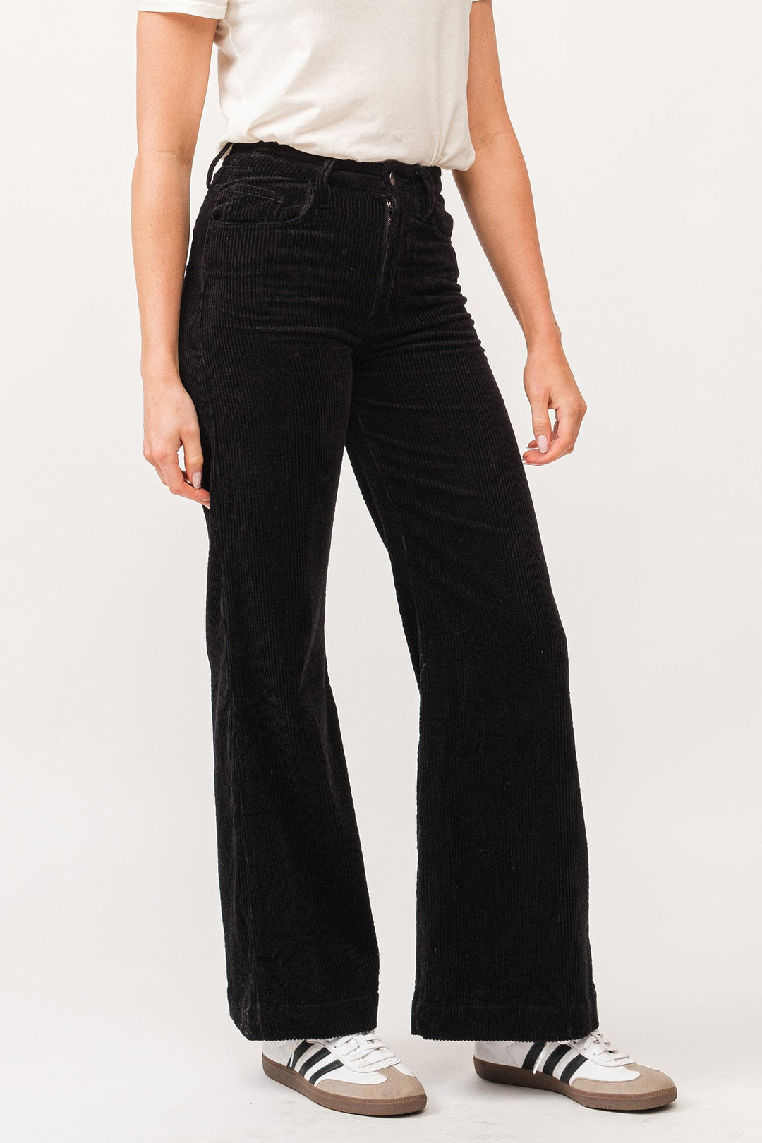 image of a female model wearing a FIONA HIGH RISE CLEAN HEM WIDE LEG PANTS BLACK CORDUROY DEAR JOHN DENIM 