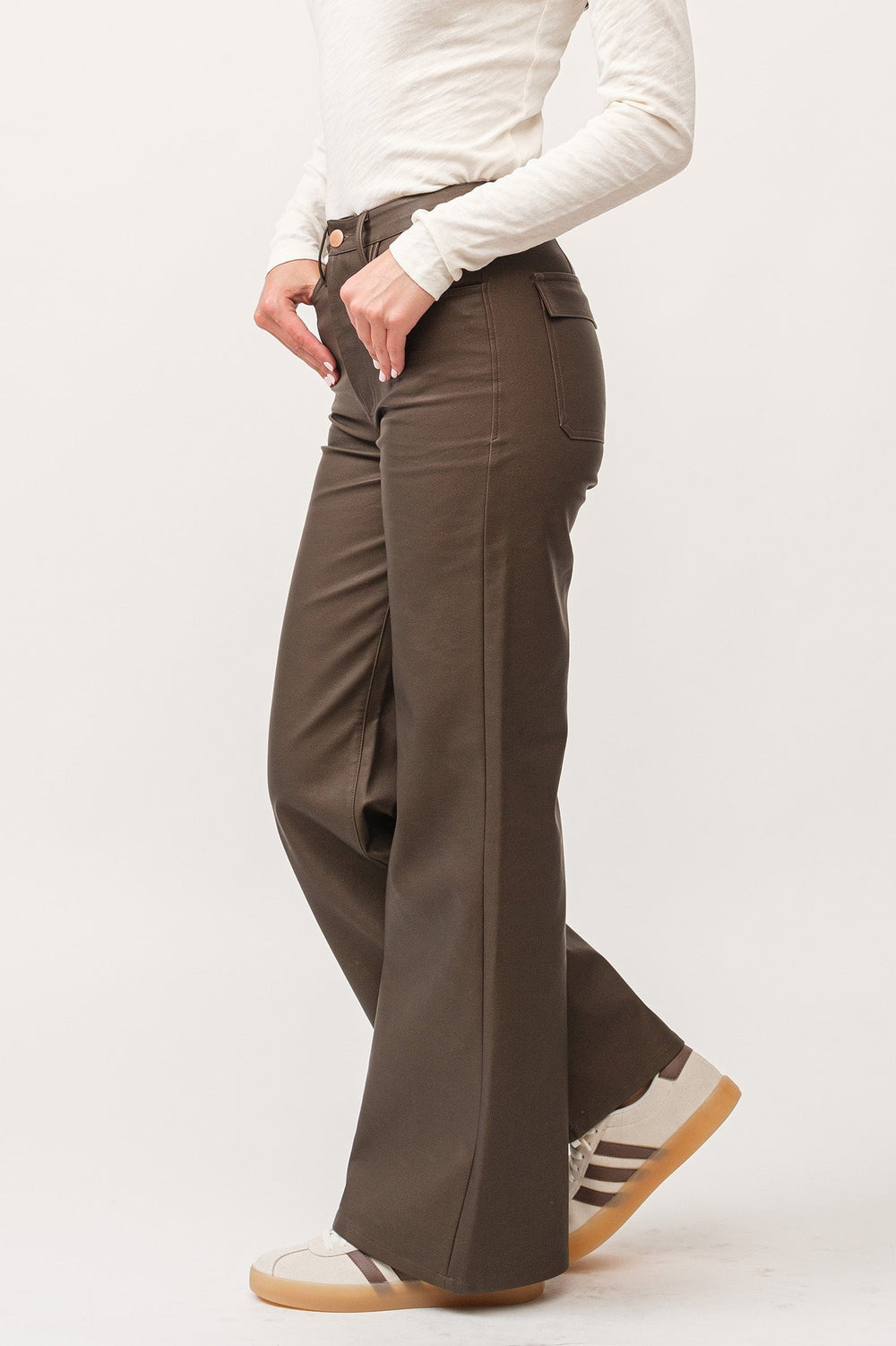 image of a female model wearing a FIONA HIGH RISE CLEAN HEM WIDE LEG PANTS TOASTED COCONUT VEGAN LEATHER DEAR JOHN DENIM 