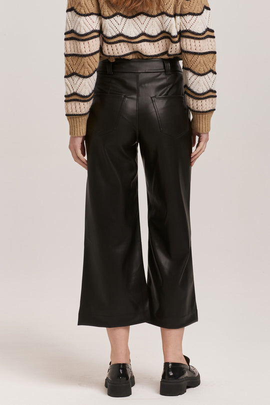 image of a female model wearing a AUDREY SUPER HIGH RISE CROPPED WIDE LEG PANTS BLACK VEGAN LEATHER DEAR JOHN DENIM 