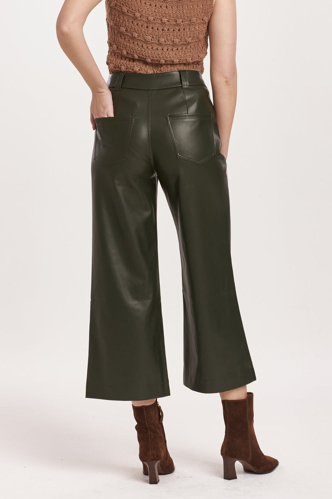 image of a female model wearing a AUDREY SUPER HIGH RISE CROPPED WIDE LEG PANTS HUNTER GREEN VEGAN LEATHER DEAR JOHN DENIM 