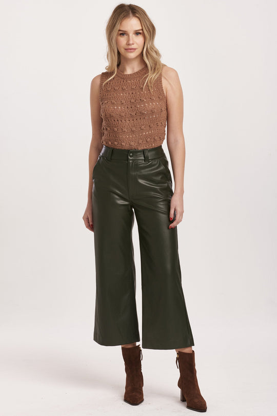 image of a female model wearing a AUDREY SUPER HIGH RISE CROPPED WIDE LEG PANTS HUNTER GREEN VEGAN LEATHER DEAR JOHN DENIM 