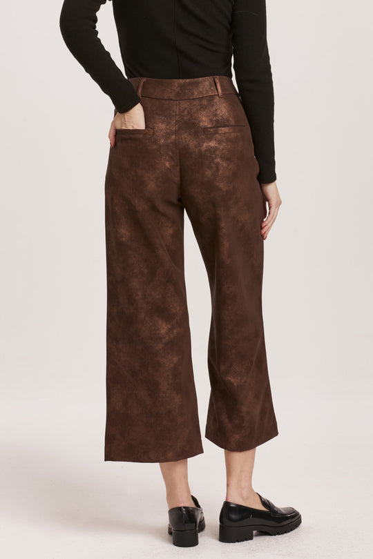 image of a female model wearing a AUDREY SUPER HIGH RISE CROPPED WIDE LEG PANTS BROWN SHIMMER VEGAN LEATHER DEAR JOHN DENIM 