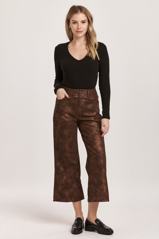 image of a female model wearing a AUDREY SUPER HIGH RISE CROPPED WIDE LEG PANTS BROWN SHIMMER VEGAN LEATHER DEAR JOHN DENIM 