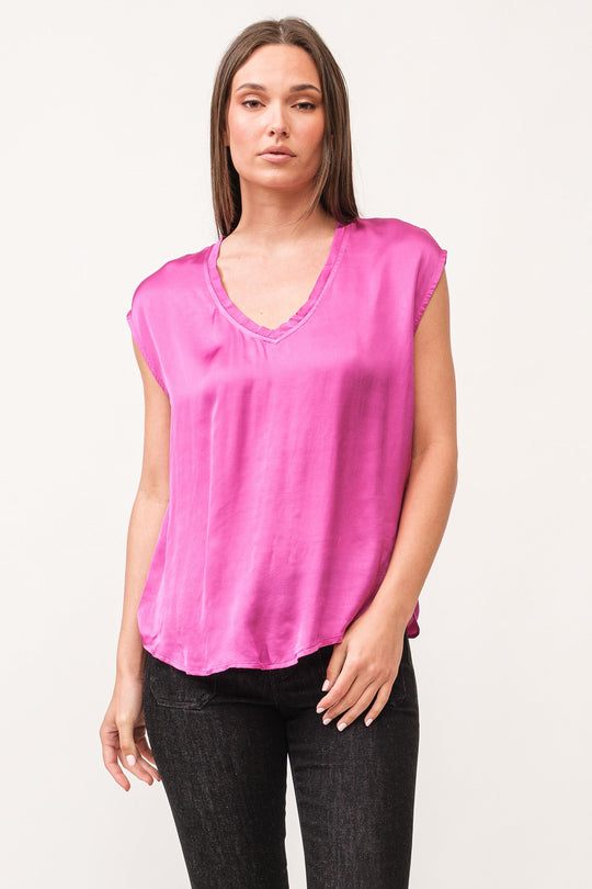 image of a female model wearing a YANIS V-NECK SLEEVELESS TOP DAHLIA MAUVE DEAR JOHN DENIM 