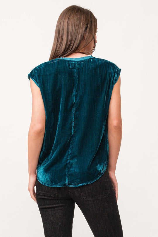 image of a female model wearing a YANIS V-NECK SLEEVELESS VELVET TOP DEEP TEAL DEAR JOHN DENIM 