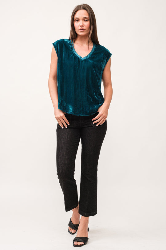 image of a female model wearing a YANIS V-NECK SLEEVELESS VELVET TOP DEEP TEAL DEAR JOHN DENIM 