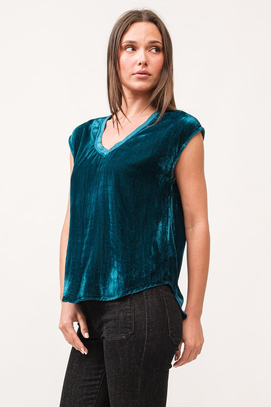 image of a female model wearing a YANIS V-NECK SLEEVELESS VELVET TOP DEEP TEAL DEAR JOHN DENIM 