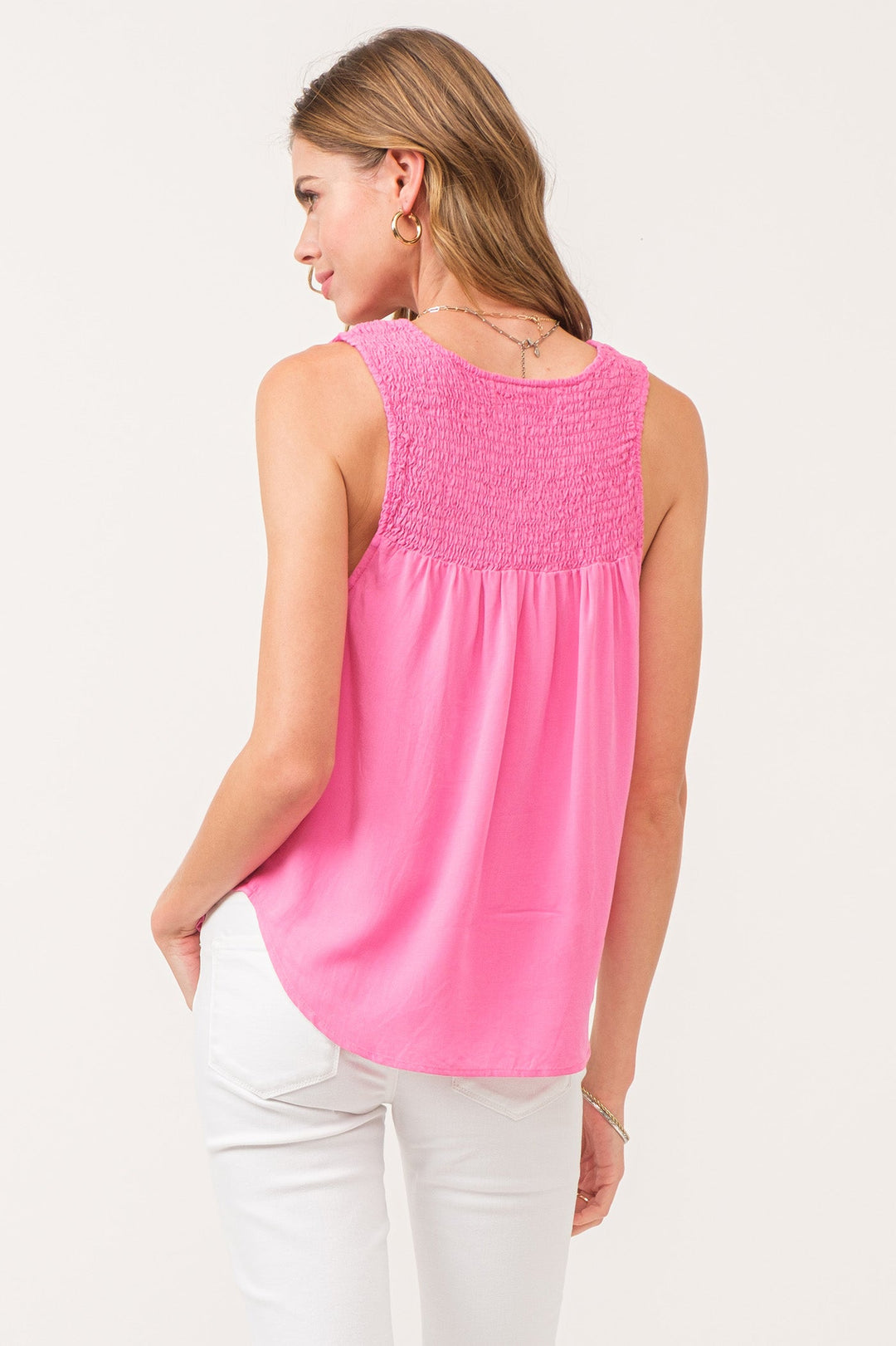 image of a female model wearing a PAIGE RUCHED DETAIL TANK CARNATION PINK DEAR JOHN DENIM 