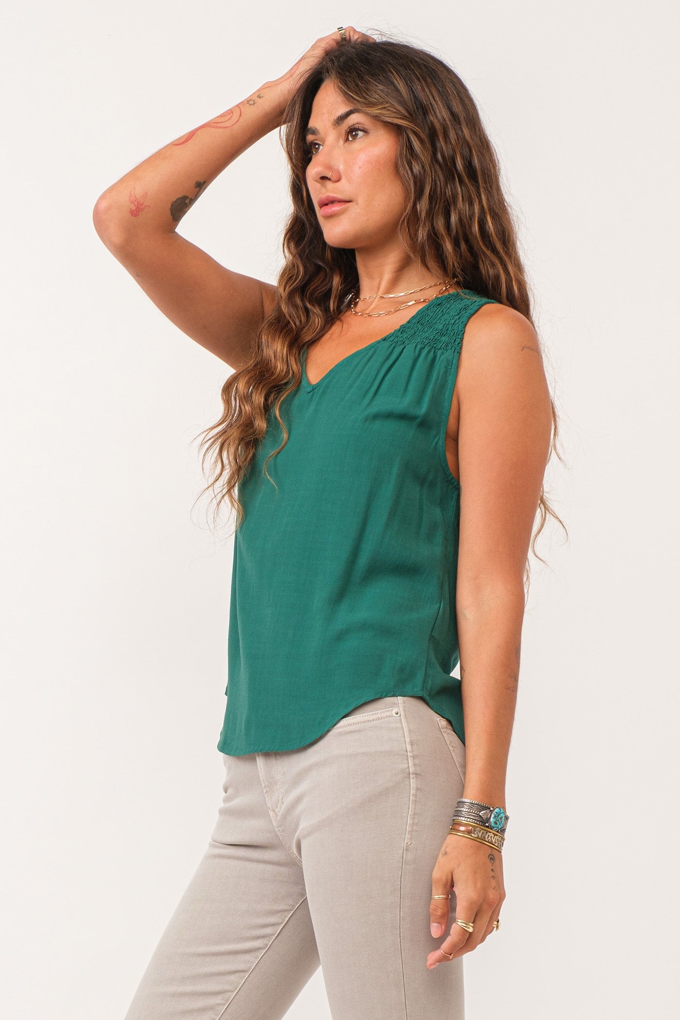 image of a female model wearing a PAIGE RUCHED DETAIL TANK GALAPAGOS GREEN DEAR JOHN DENIM 