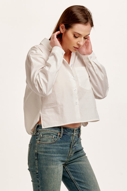 image of a female model wearing a MARIBEL BACK PLEAT SHIRT WHITE DEAR JOHN DENIM 