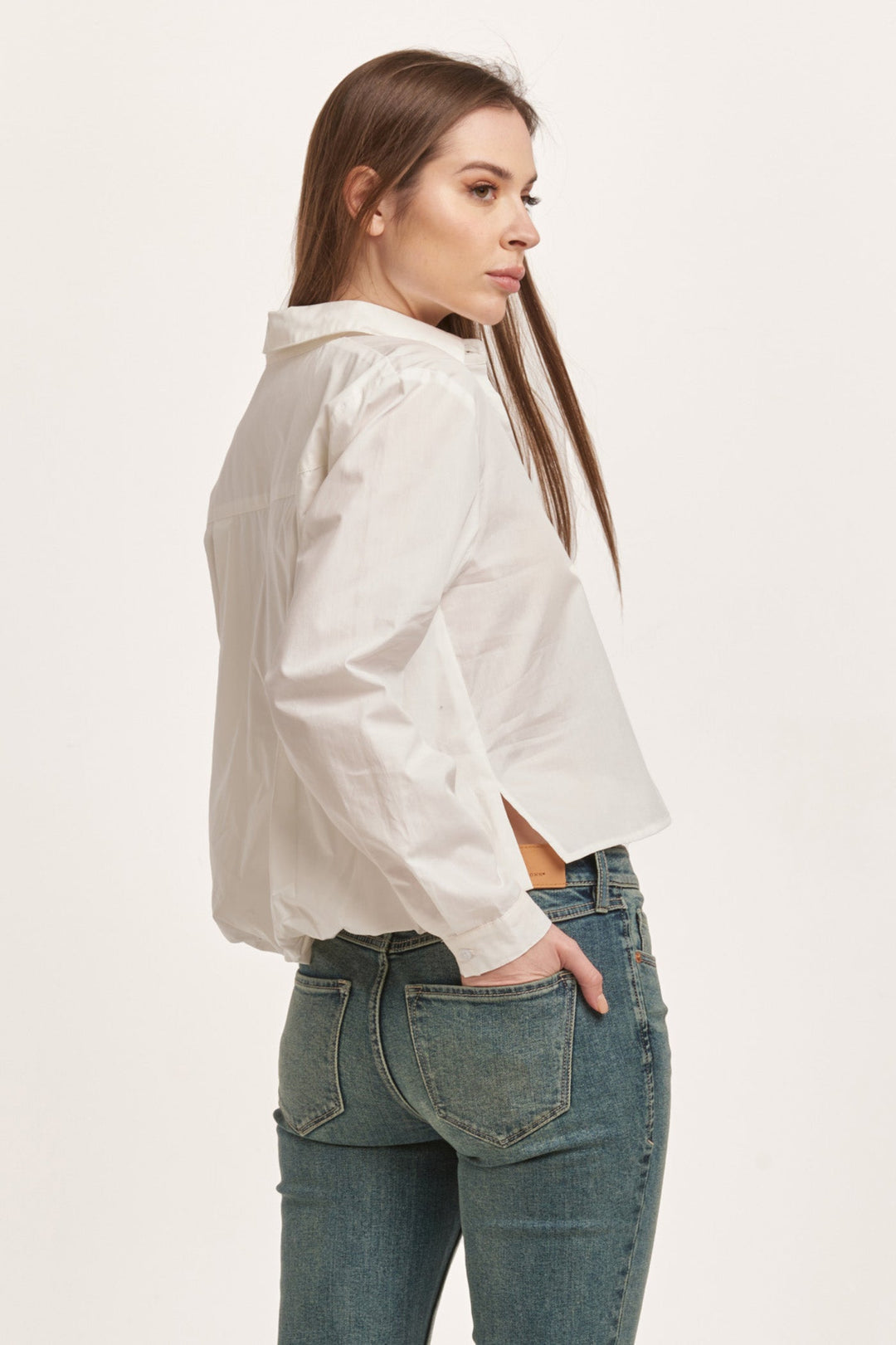 image of a female model wearing a MARIBEL BACK PLEAT SHIRT WHITE DEAR JOHN DENIM 