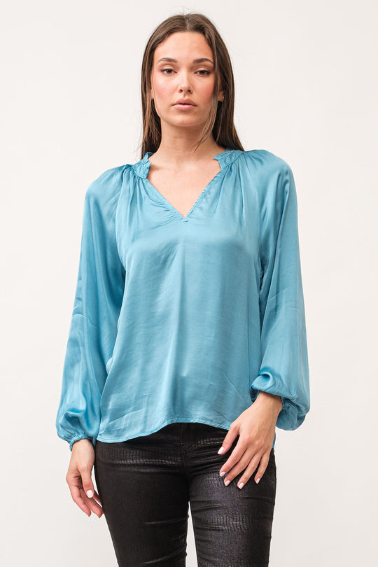 image of a female model wearing a MANON V-NECK LONG SLEEVE TOP BLUE SHADOW DEAR JOHN DENIM 