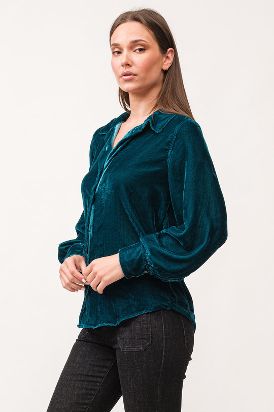 image of a female model wearing a MIRABELLE COLLARED BUTTON DOWN LONG SLEEVE SHIRT DEEP TEAL DEAR JOHN DENIM 