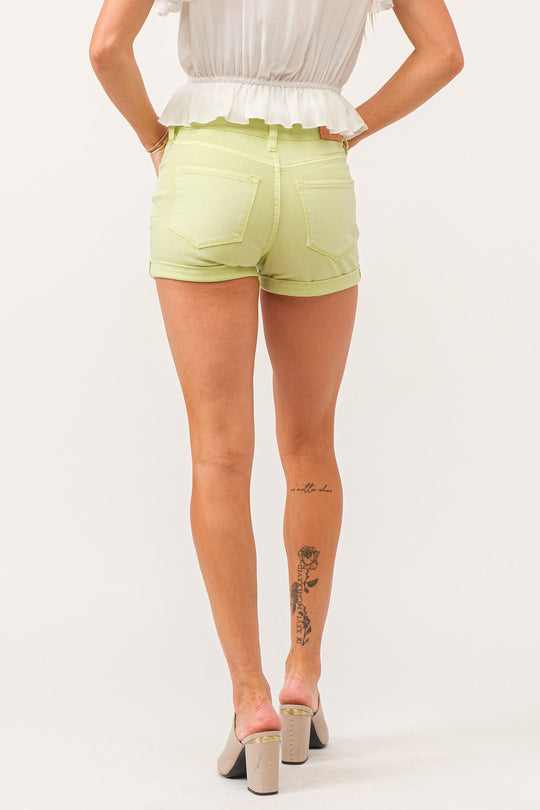 image of a female model wearing a AVA MID RISE COLOR SHORTS CYBER LIME DEAR JOHN DENIM 