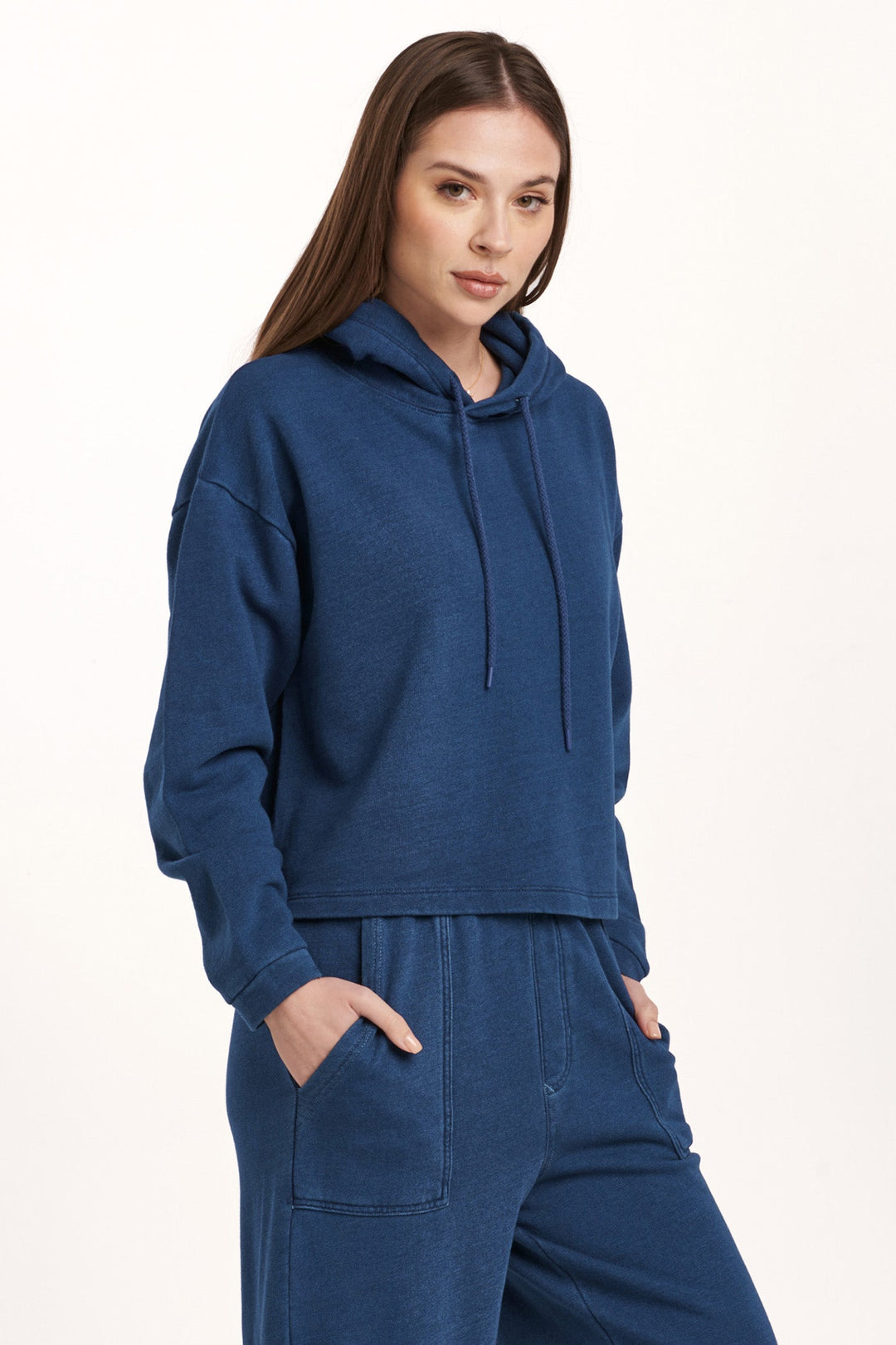 image of a female model wearing a PAXTON HOODIE SWEATSHIRT DARK INDIGO DEAR JOHN DENIM 