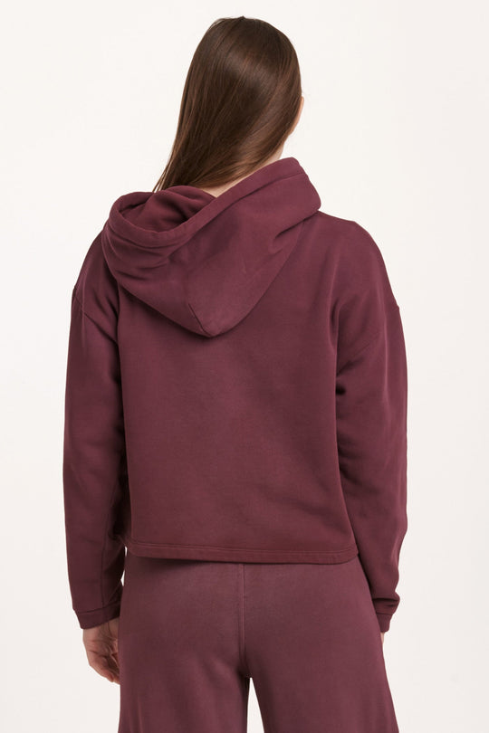 image of a female model wearing a PAXTON HOODIE SWEATSHIRT PLUM BERRY DEAR JOHN DENIM 