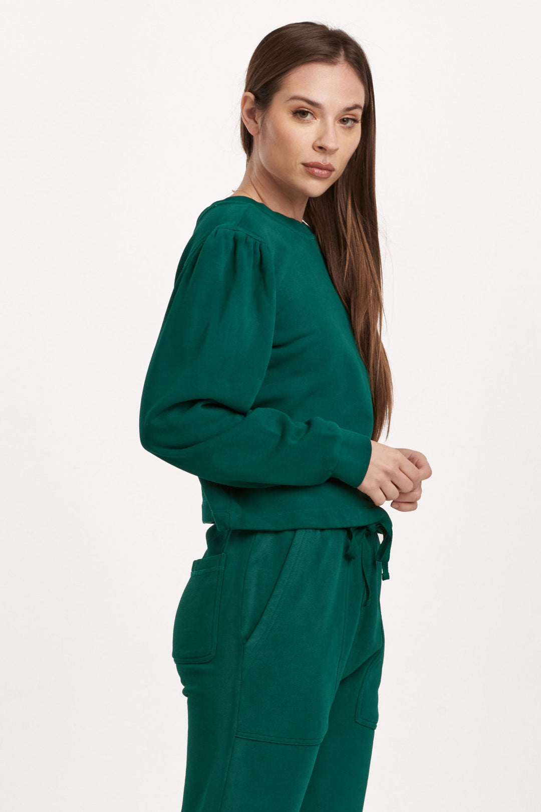 image of a female model wearing a RAYA SCOOP BACK SWEATSHIRT DEEP EMERALD DEAR JOHN DENIM 