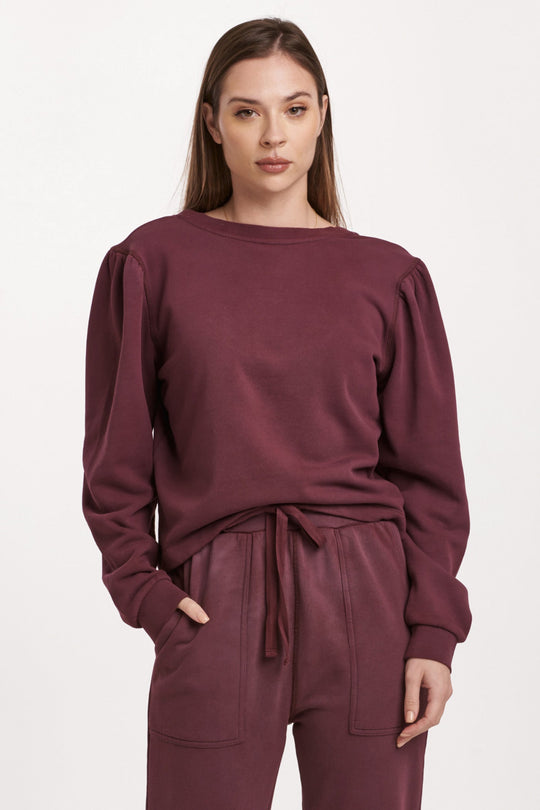 image of a female model wearing a RAYA SCOOP BACK SWEATSHIRT PLUM BERRY DEAR JOHN DENIM 