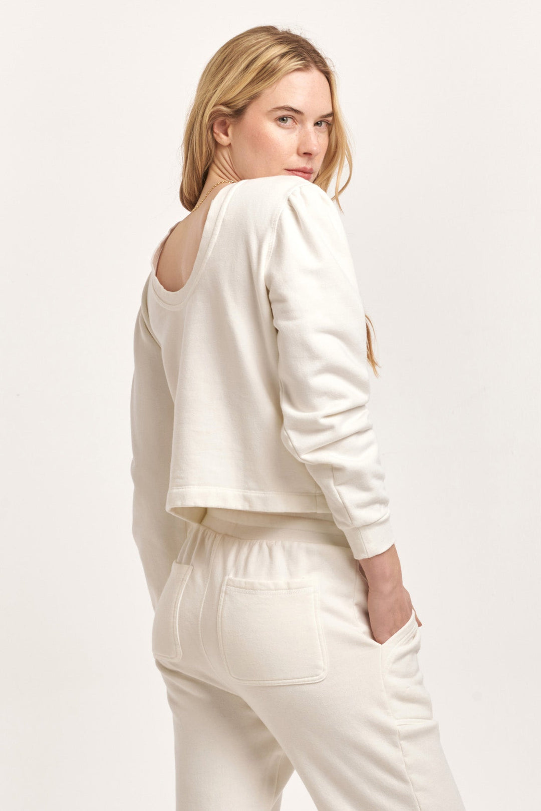 image of a female model wearing a RAYA SCOOP BACK SWEATSHIRT OFF WHITE DEAR JOHN DENIM 