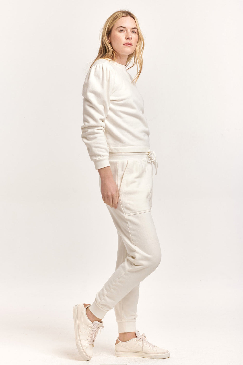 image of a female model wearing a RAYA SCOOP BACK SWEATSHIRT OFF WHITE DEAR JOHN DENIM 