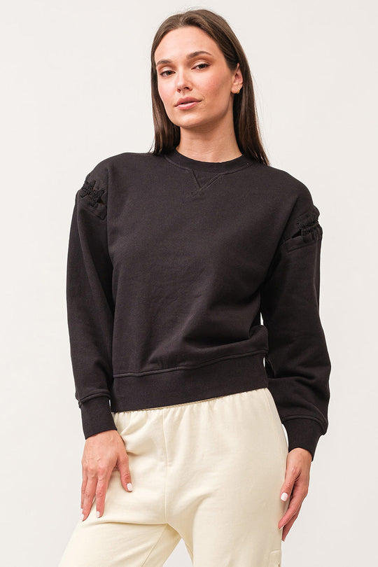 image of a female model wearing a LUCINDA CREW NECK LONG SLEEVE RELAXED FIT SWEATER BLACK DEAR JOHN DENIM 