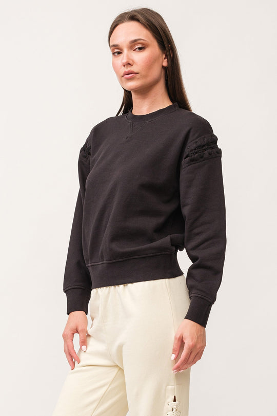 image of a female model wearing a LUCINDA CREW NECK LONG SLEEVE RELAXED FIT SWEATER BLACK DEAR JOHN DENIM 