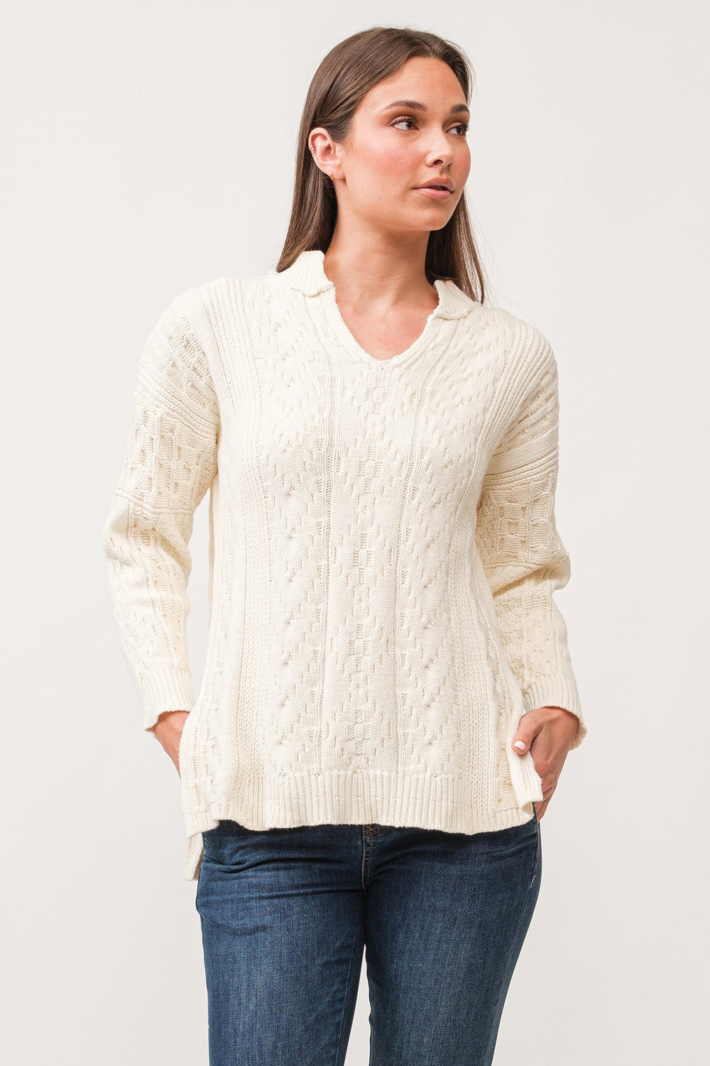 image of a female model wearing a THORA V-NECK LONG SLEEVE RELAXED FIT SWEATER ANTIQUE WHITE DEAR JOHN DENIM 