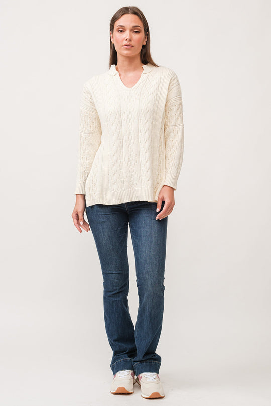 image of a female model wearing a THORA V-NECK LONG SLEEVE RELAXED FIT SWEATER ANTIQUE WHITE DEAR JOHN DENIM 