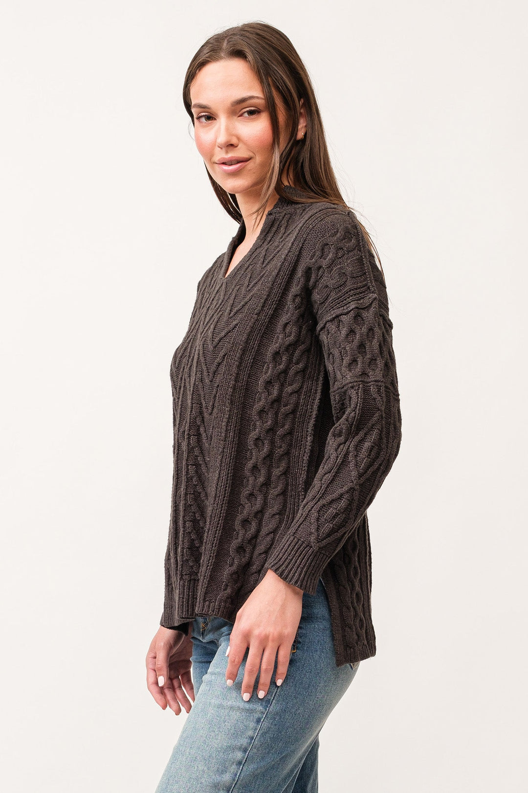 image of a female model wearing a THORA V-NECK LONG SLEEVE RELAXED FIT SWEATER CHARCOAL DEAR JOHN DENIM 