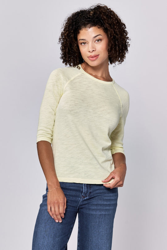 image of a female model wearing a SONOMA CREW NECK RAGLAN SLUB JERSEY TOP PALE LIME YELLOW DEAR JOHN DENIM 