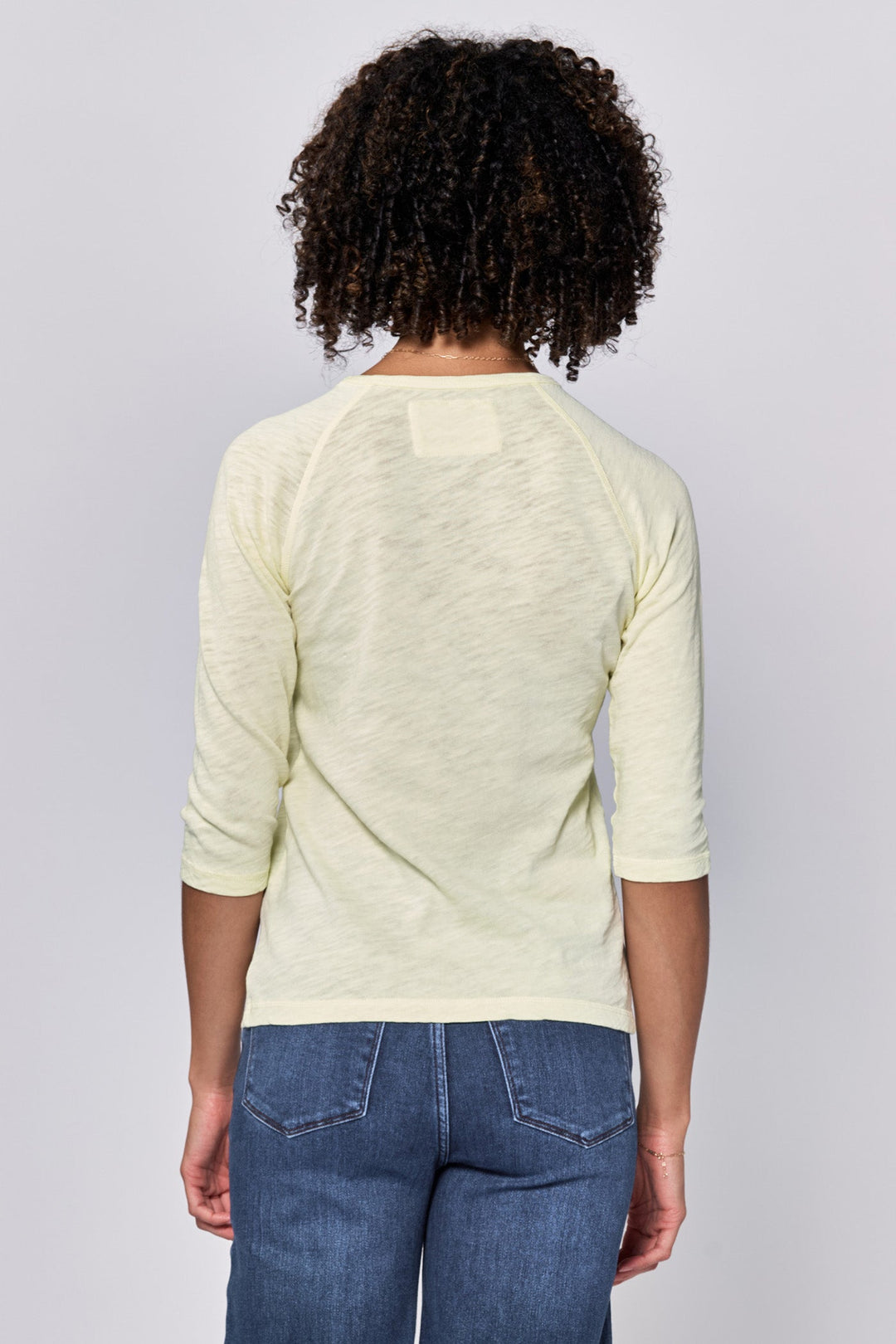 image of a female model wearing a SONOMA CREW NECK RAGLAN SLUB JERSEY TOP PALE LIME YELLOW DEAR JOHN DENIM 