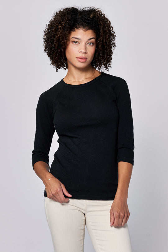 image of a female model wearing a SONOMA CREW NECK RAGLAN SLUB JERSEY TOP BLACK DEAR JOHN DENIM 