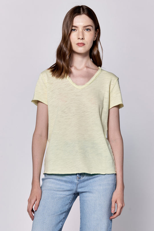 image of a female model wearing a VANYA V-NECK SHORT SLEEVE SLUB JERSEY TOP PALE LIME YELLOW DEAR JOHN DENIM 