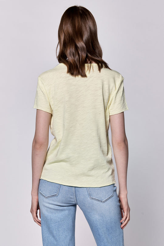 image of a female model wearing a VANYA V-NECK SHORT SLEEVE SLUB JERSEY TOP PALE LIME YELLOW DEAR JOHN DENIM 