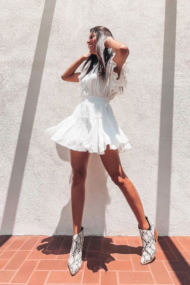 image of a female model wearing a NAYELI RUFFLES DRESS WHITE DEAR JOHN DENIM 