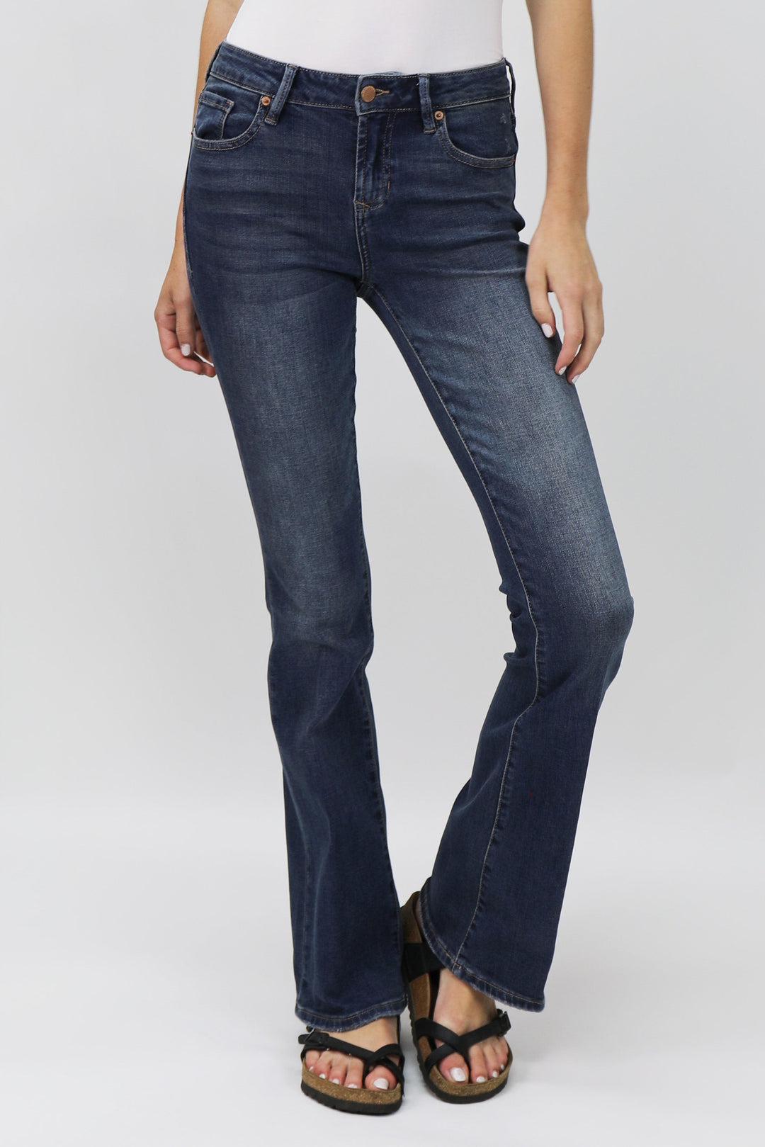 image of a female model wearing a jaxtyn high rise bootcut jeans millbridge JEANS