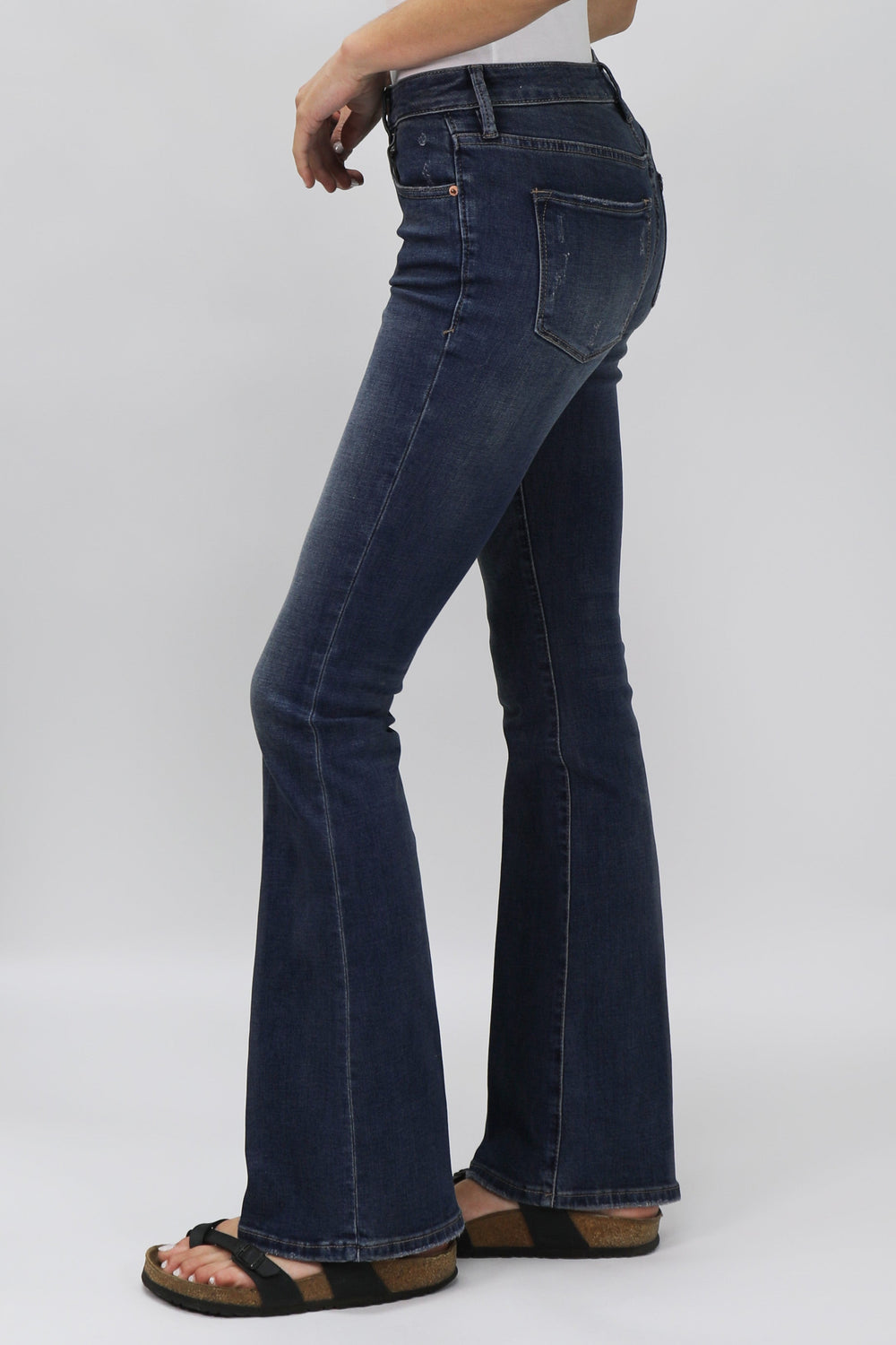 image of a female model wearing a JAXTYN HIGH RISE BOOTCUT JEANS MILLBRIDGE DEAR JOHN DENIM 