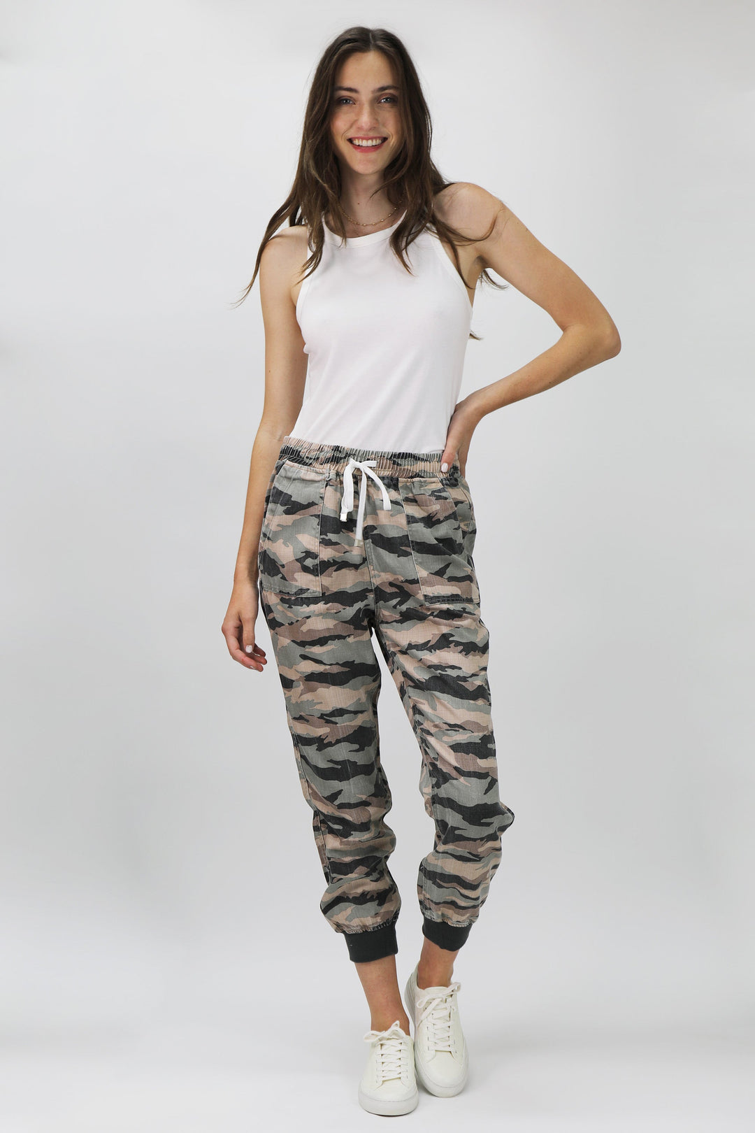 image of a female model wearing a JACEY SUPER HIGH RISE CROPPED JOGGER PANTS SAGE CAMO PANTS