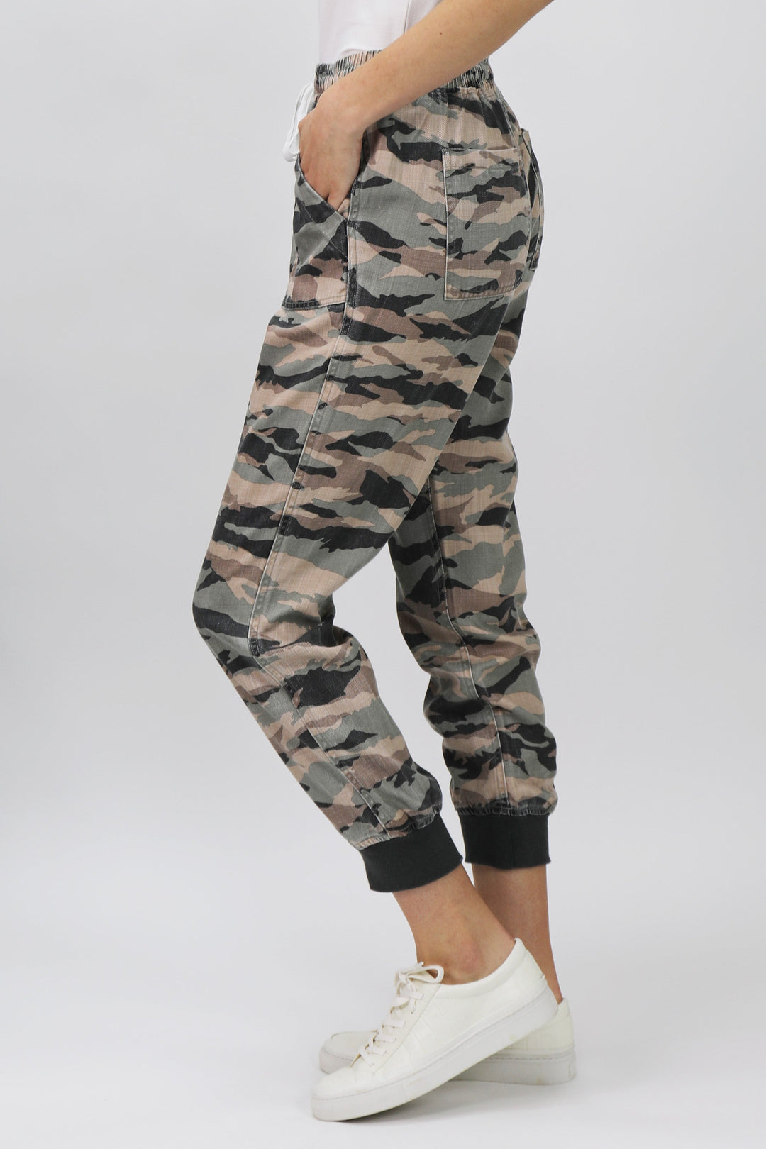 image of a female model wearing a JACEY SUPER HIGH RISE CROPPED JOGGER PANTS SAGE CAMO PANTS