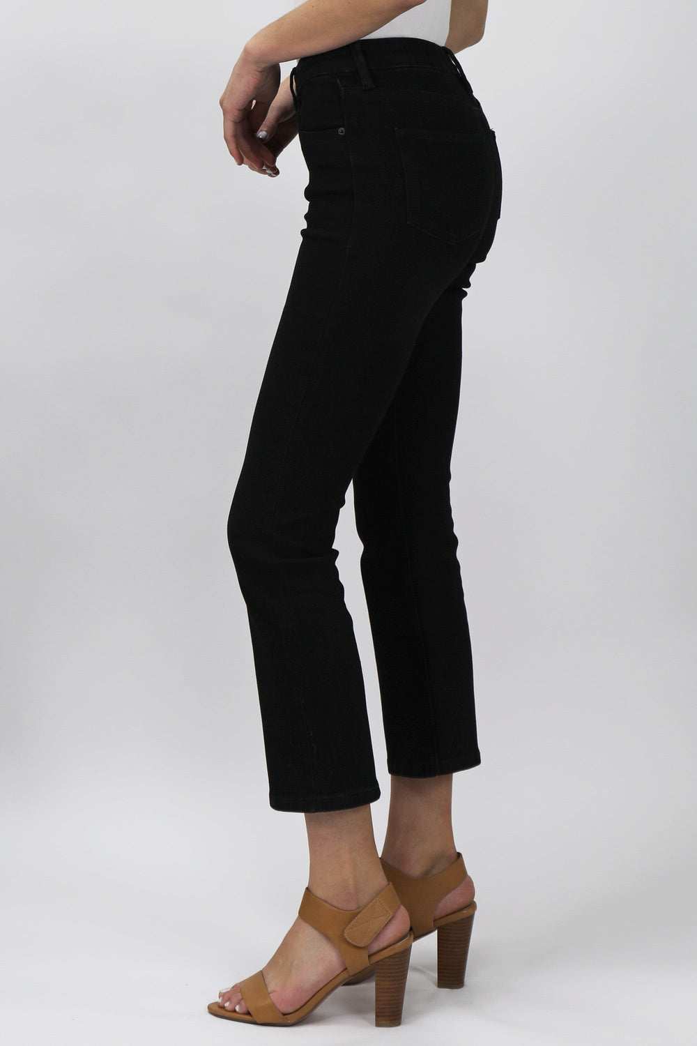 image of a female model wearing a jeanne super high rise cropped flare leg jeans blackwell JEANS