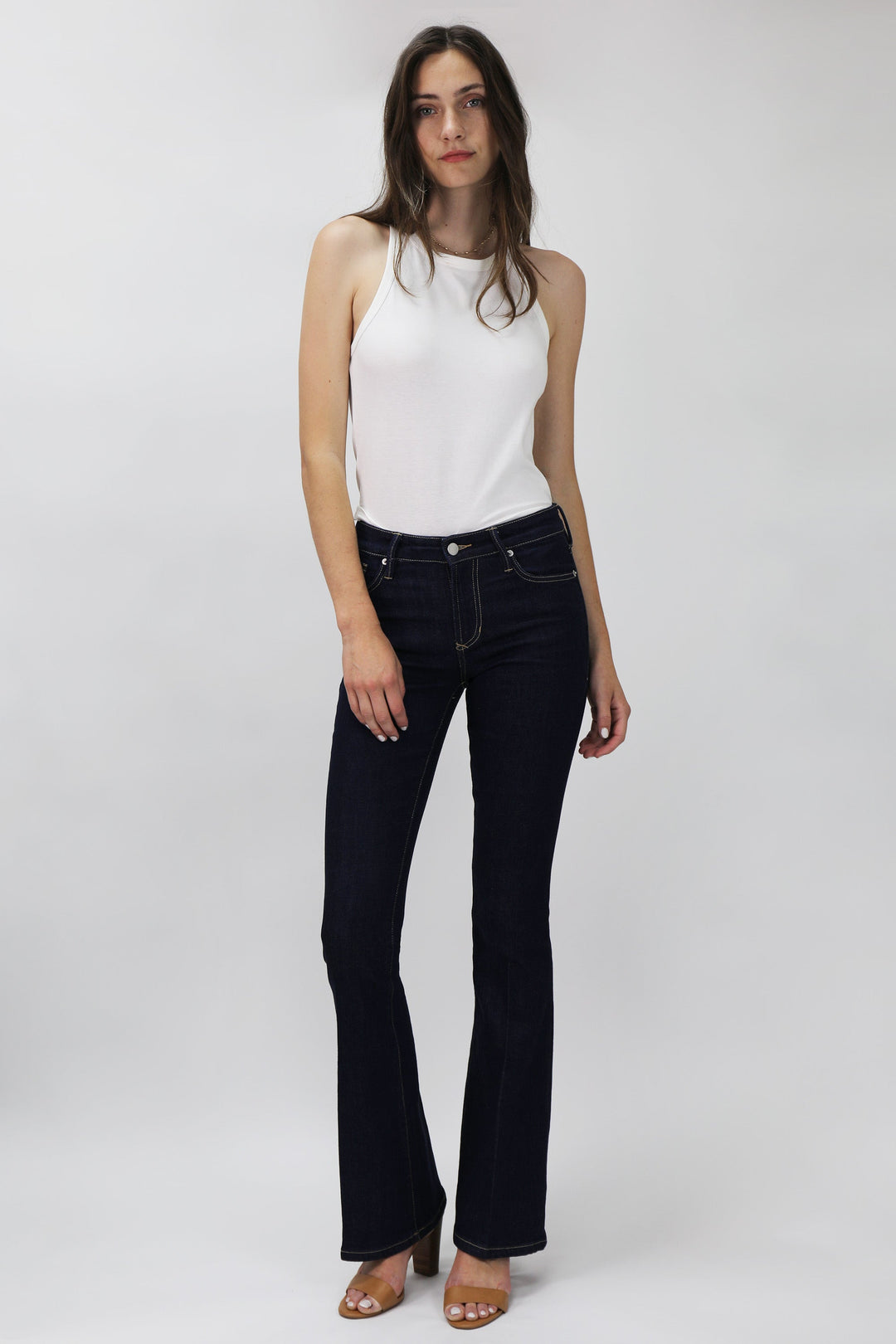 image of a female model wearing a rosa high rise flare leg jeans breakwater JEANS