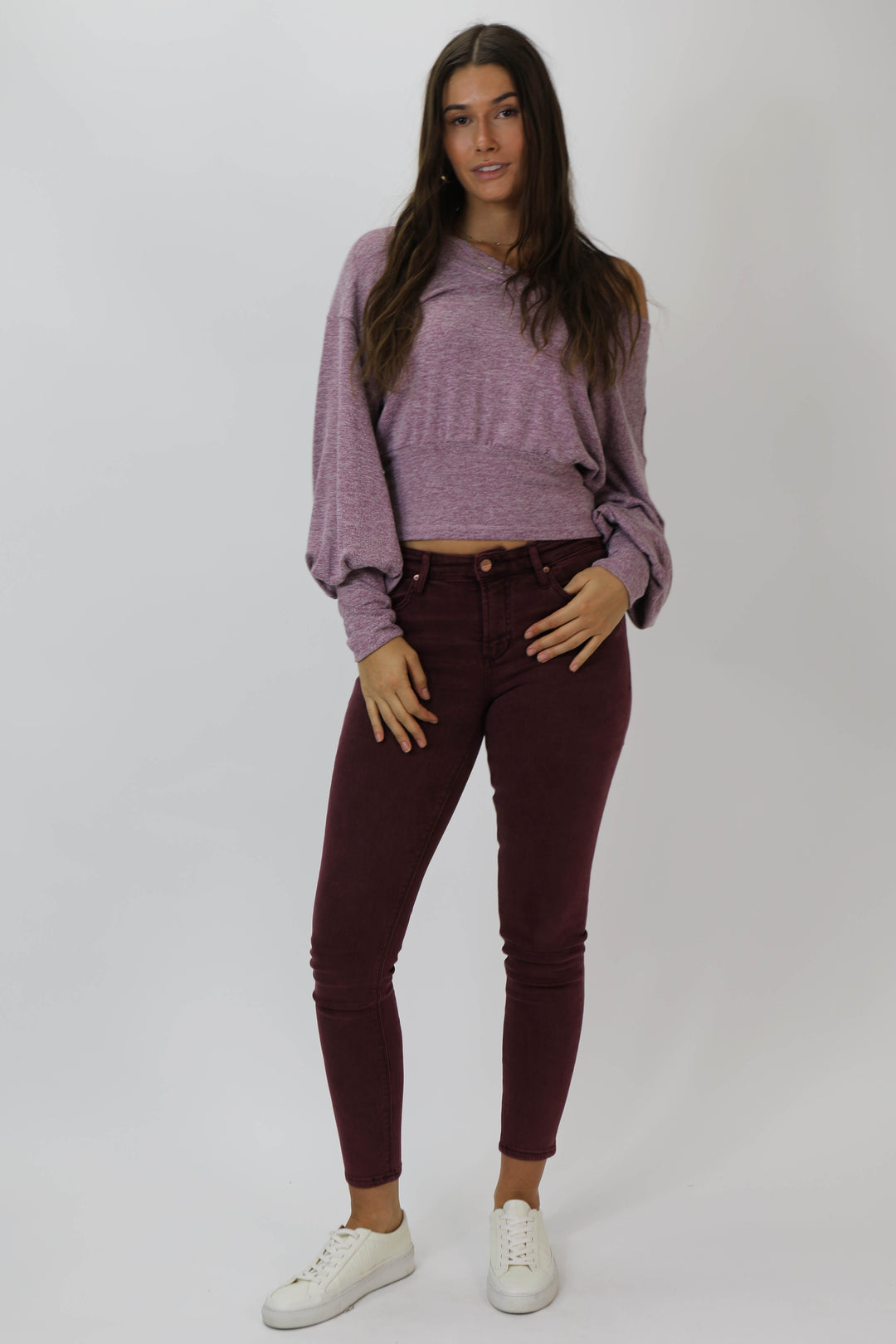 image of a female model wearing a GISELE HIGH RISE ANKLE SKINNY JEANS CABERNET JEANS